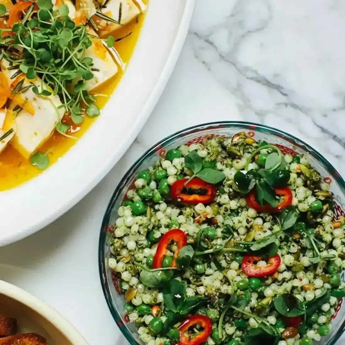 Part-time private chef plating couscous and sea bass for a Las Vegas client
